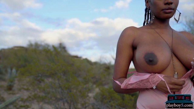 Huge boobs ebony MILF model Nyla solo striptease outdoor for Playboy